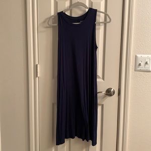 Simple sleeveless navy blue dress with pockets